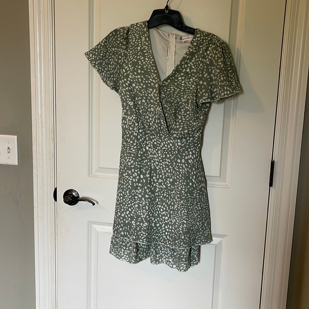 Adorable tiered skirt dress with tie back and wrap front